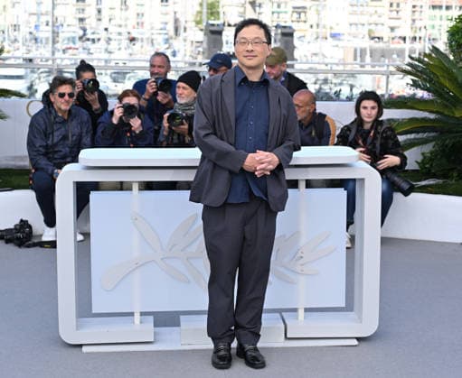 79th Cannes Film Festival: Nagi Notes photocall CANNES, FRANCE - MAY 14: Japanese director and screenwriter Koji Fukada poses during a photocall for the film Nagi Notes at the 79th edition of the Cannes Film Festival in Cannes, France on May 14, 2026. Mustafa Yalcin Anadolu Cannes France. Editorial use only. Please get in touch for any other usage.  Copyright: x2026xAnadoluxMustafaxYalcinx