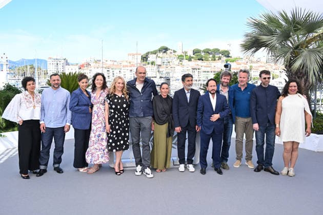 79th Cannes Film Festival: L Abandon (Forsaken) photocall CANNES, FRANCE - MAY 14: (L to R) French actress Mounira Barbouch, French actor Nedjim Bouizzoul, French actress Emma Boumali, French actress Emmanuelle Bercot, French director and screenwriter Vincent Garenq, Samuel Paty s sister Mickaelle Paty, French actor Azize Kabouche, French actor Antoine Reinartz and Algerian actress Ahlam Slama pose during a photocall for the film L Abandon (Forsaken) at the 79th edition of the Cannes Film Festival in Cannes, France on May 14, 2026. Mustafa Yalcin Anadolu Cannes France. Editorial use only. Please get in touch for any other usage. Copyright: x2026xAnadoluxMustafaxYalcinx