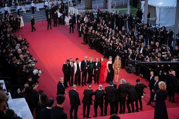 Cannes Histoires Paralleles Red Carpet EB French actress India Hair, French producer Alexandre Mallet-Guy, French actor Pierre Niney, Belgian-French actress Virginie Efira, French actress Isabelle Huppert, Iranian director Asghar Farhadi, French actor Adam Bessa, French actress Catherine Deneuve, French actor Vincent Cassel arrive for the screening of the film Histoires Paralleles (Parallel Tales) at the 79th edition of the Cannes Film Festival in Cannes, southern France on May 14, 2026.Photo by Eliot Blondet ABACAPRESS.COM Cannes France France Copyright: xBlondetxEliot ABACAx