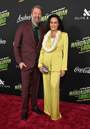 ˜Star Wars: The Mandalorian and Grogu™ World Premiere Paul Debevec and Tia Carrere arriving to Star Wars: The Mandalorian and Grogu world premiere held at the TCL Chinese Theatre on May 14, 2026 in Hollywood, CA. Hollywood TCL Chinese Theatre California USA Copyright: xLisaxOConnorx xAFF-USA.comx