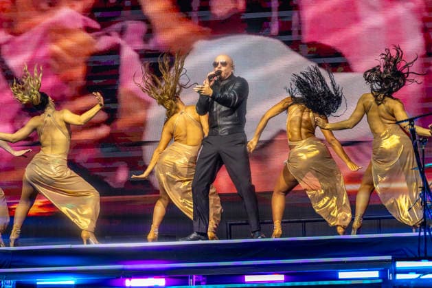 Pitbull performs on stage during the I AM BACK tour at the iTHINK Financial Amphitheater in West Palm Beach, Florida on Thursday, May 14, 2026.  MIA20260515111 GARYxIxROTHSTEIN