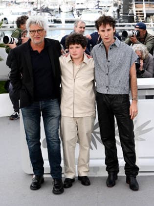 IPA84714947 - Cannes, 79th Cannes Film Festival 2026, Day 4 - Photocall Film Les Caprices de L enfant Roi. Pictured are Michel Leclerc, Niels Hamel-Brochen and Nemo Schiffman  Copyright: xAlbertoxTerenghix xPoolxPhotoxEventsx07x 84714947