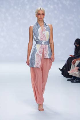 Australian Fashion Week 2026 - Runway - Ngali A model walks the runway during the Ngali Wander with Wonder Runway show at Australian Fashion Week 2026 at the Museum of Contemporary Art on May 15, 2026 in Sydney, Australia., Credit:IOIO IMAGES IOIO Avalon Australia, New South Wales, Sydney, Museum of Contemporary Art  Copyright: xIOIOxIMAGESx xIOIOx xAvalonx 1099145832