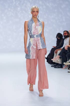 Australian Fashion Week 2026 - Runway - Ngali A model walks the runway during the Ngali Wander with Wonder Runway show at Australian Fashion Week 2026 at the Museum of Contemporary Art on May 15, 2026 in Sydney, Australia., Credit:IOIO IMAGES IOIO Avalon Australia, New South Wales, Sydney, Museum of Contemporary Art  Copyright: xIOIOxIMAGESx xIOIOx xAvalonx 1099145845