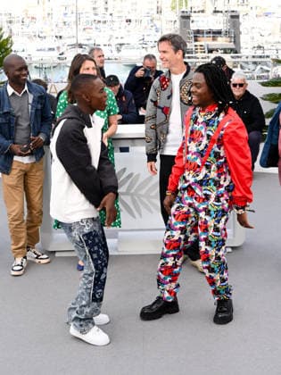 IPA84713584 - Cannes, 79th Cannes Film Festival 2026, Day 4 - Photocall Film Congo. Pictured are Rafiki Fariala, Bradley Fiomona Dembeasset  Copyright: xAlbertoxTerenghix xPoolxPhotoxEventsx07x 84713584
