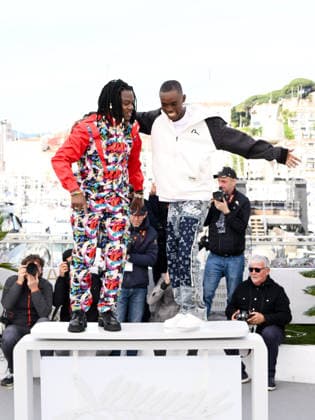 IPA84713599 - Cannes, 79th Cannes Film Festival 2026, Day 4 - Photocall Film Congo. Pictured are Rafiki Fariala, Bradley Fiomona Dembeasset  Copyright: xAlbertoxTerenghix xPoolxPhotoxEventsx07x 84713599