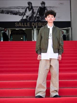 IPA84718081 - Cannes, 79th Cannes Film Festival 2026, Day 4 - Red Carpet Film Club Kid. Pictured is Reggie Absolom  Copyright: xSimonexComix xPoolxPhotoxEventsx07x 84718081