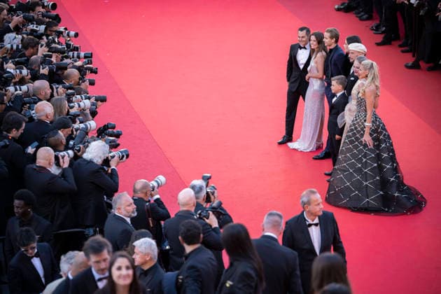 Cannes Karma Red Carpet EB Olga Hoffmann, Kelly B. Eviston, a guest, John Travolta, Ella Bleu Travolta, Edouard Philipponnat, Amy Laslett and Jason Berger during the Karma red carpet during the 79th Cannes Film Festival in Cannes, France on May 15, 2026. Photo by Eliot Blondet ABACAPRESS.COM Cannes France France  Copyright: xBlondetxEliot ABACAx