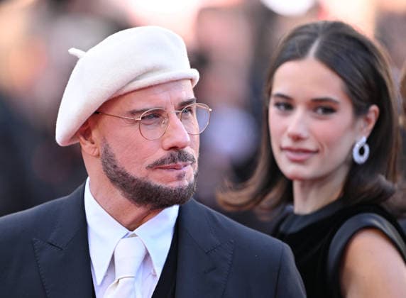 79th Cannes Film Festival: Karma screening CANNES, FRANCE - MAY 15: US director, screenwriter and writer John Travolta (L) and US actress Ella Bleu Travolta (R) arrive for the screening of the film Karma at the 79th edition of the Cannes Film Festival in Cannes, France on May 15, 2026. Mustafa Yalcin Anadolu Cannes France. Editorial use only. Please get in touch for any other usage.  Copyright: x2026xAnadoluxMustafaxYalcinx