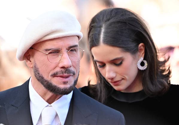 79th Cannes Film Festival: Karma screening CANNES, FRANCE - MAY 15: US director, screenwriter and writer John Travolta (L) and US actress Ella Bleu Travolta (R) arrive for the screening of the film Karma at the 79th edition of the Cannes Film Festival in Cannes, France on May 15, 2026. Mustafa Yalcin Anadolu Cannes France. Editorial use only. Please get in touch for any other usage.  Copyright: x2026xAnadoluxMustafaxYalcinx