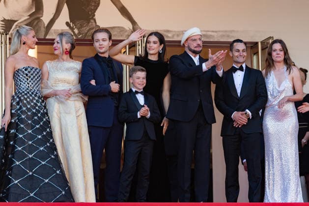 Cannes Karma screening NG Edouard Philipponnat, guest, Ella Bleu Travolta, John Travolta, Jason Berger and Amy Laslett attending the ‘Karma’ Screening and Red Carpet at Palais Des Festivals in Cannes, France on May 15 2026 as part of the 79th Cannes Film Festival. Photo by Nicolas Genin ABACAPRESS.COM Cannes France  Copyright: xGeninxNicolas ABACAx