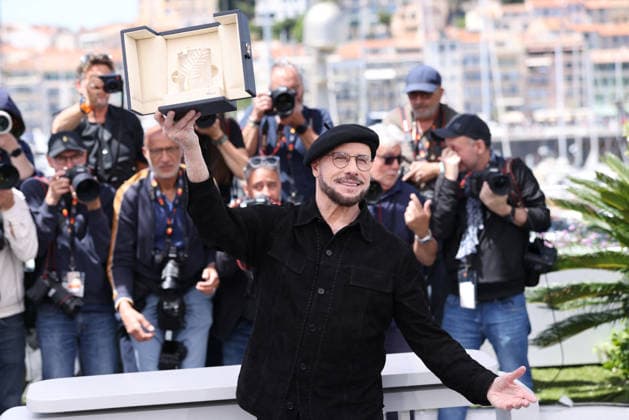 Cannes - Propeller One-Way Night Coach Photocall JD John Travolta attending the Propeller One-Way Night Coach photocall during the 79th annual Cannes Film Festival at Palais des Festivals on May 16, 2026 in Cannes, France. Photo by Jerome Domine ABACAPRESS.COM Cannes France  Copyright: xDominexJerome ABACAx