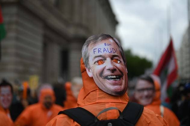 Nakba Day march in London LONDON, UNITED KINGDOM - MAY 16: A person dressed in an orange costume wearing a Nigel Farage face mask takes part in march through the streets during a demonstration marking the Nakba Day in London, United Kingdom on May 16, 2026. Chanting slogans in support of Palestinians, the protesters marched through the city center and also voiced opposition to a far-right demonstration held the same day. Police took extensive security measures along the route and in surrounding areas. Rasid Necati Aslim Anadolu London United Kingdom. Editorial use only. Please get in touch for any other usage.  Copyright: x2026xAnadoluxRasidxNecatixAslimx