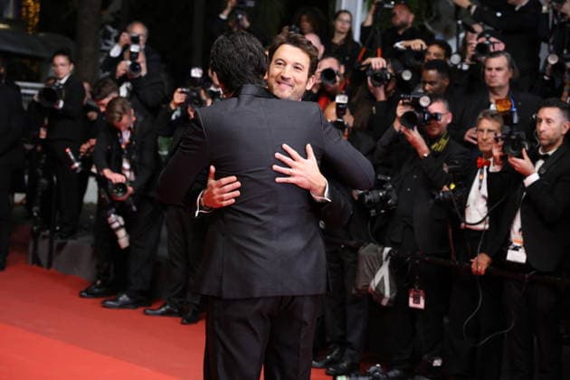 Cannes - Paper Tiger Red Carpet Adam Driver hugs Miles Teller while attending the Paper Tiger screening on the red carpet during the 79th annual Cannes Film Festival at Palais des Festivals on May 16, 2026 in Cannes, France. Photo by Jerome Domine ABACAPRESS.COM Cannes France  Copyright: xDominexJerome ABACAx