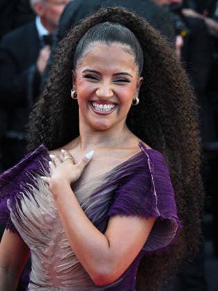 IPA84761908 - Cannes, 79th Cannes Film Festival 2026, evening 5 - red carpet of EL SER QUERIDO (THE BELOVED) Pictured: Kenza Bel Kenadil  Copyright: xManuelexMangiarottix xPoolxPhotoxEventsx07x 84761908