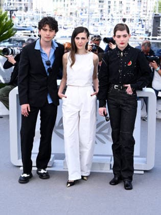 IPA84781972 - Cannes, 79th Cannes Film Festival 2026, Day 6. Photocall of the film I ll Be Gone In June. Pictured are David Flores, Katharina Rivilis, Naomi Cosma  Copyright: xAlbertoxTerenghix xPoolxPhotoxEventsx07x 84781972