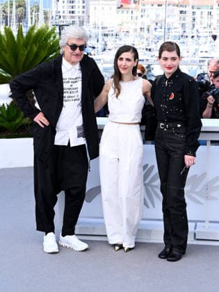 IPA84782011 - Cannes, 79th Cannes Film Festival 2026, Day 6. Photocall of the film I ll Be Gone In June. Pictured are Wim Wenders, Katharina Rivilis, Naomi Cosma  Copyright: xAlbertoxTerenghix xPoolxPhotoxEventsx07x 84782011