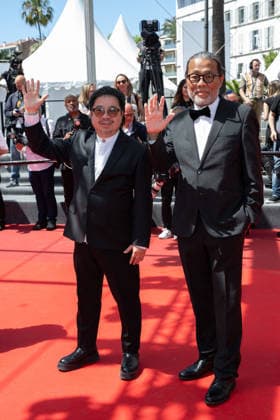 Cannes Moulin screening NG Mark Lee Ping Bin and a guest attending the ‘Moulin’ Screening and Red Carpet at Palais Des Festivals in Cannes, France on May 17 2026 as part of the 79th Cannes Film Festival. Photo by Nicolas Genin ABACAPRESS.COM Cannes France  Copyright: xGeninxNicolas ABACAx