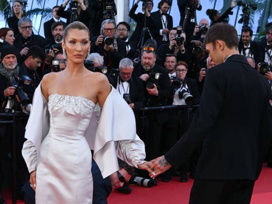 IPA84794580 - Cannes, 79th Cannes Film Festival 2026, Evening 6. Red Carpet film Garance Pictured: Bella Hadid with her brother Anwar Hadid  Copyright: xAlbertoxTerenghix xPoolxPhotoxEventsx07x 84794580