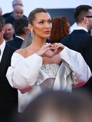 IPA84794598 - Cannes, 79th Cannes Film Festival 2026, Evening 6. Red Carpet film Garance Pictured: Bella Hadid with her brother Anwar Hadid  Copyright: xAlbertoxTerenghix xPoolxPhotoxEventsx07x 84794598