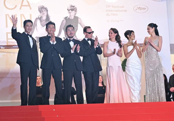 79th Cannes Film Festival: Hope screening CANNES, FRANCE - MAY 17: (L to R) South Korean actor Zo In-Sung, South korean actor Hwang Jung-Min, South Korean director and screenwriter Na Hong-Jin, German actor Michael Fassbender, Swedish actress Alicia Vikander, Canadian actress Taylor Russell and South Korean actress Ho-yeon Jung arrive for the screening of the film Hope at the 79th edition of the Cannes Film Festival in Cannes, France on May 17, 2026. Mustafa Yalcin Anadolu Cannes France. Editorial use only. Please get in touch for any other usage.  Copyright: x2026xAnadoluxMustafaxYalcinx