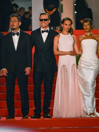 IPA84804022 - Cannes, 79th Cannes Film Festival 2026, Evening 6. Red Carpet film Hope Pictured: Na Hong-jin, Michael Fassbender, Alicia Vikander, Taylor Russell  Copyright: xAlbertoxTerenghix xPoolxPhotoxEventsx07x 84804022