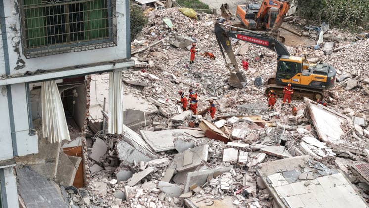(260518) -- LIUZHOU, May 18, 2026 -- An aerial drone photo taken on May 18, 2026 shows rescuers carrying out rescue operations after an earthquake in Taiyangcun Community of Taiyangcun Town, Liuzhou, south China s Guangxi Zhuang Autonomous Region. A 5.2-magnitude earthquake struck Liuzhou City in south China s Guangxi Zhuang Autonomous Region early Monday, local earthquake relief headquarters said. (Photo by Xinhua) (SpotNews) CHINA-GUANGXI-LIUZHOU-EARTHQUAKE-RESCUE (CN) LixHanchi 