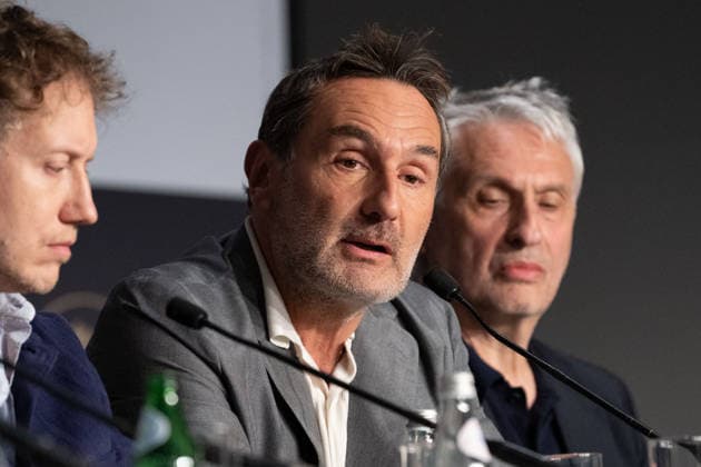 Cannes Moulin Press Conference NG Lars Eidinger, Laszlo Nemes and Gilles Lellouche attending the Press Conference for ‘Moulin’ in Cannes at Palais Des Festivals in Cannes, France on May 15 2026 as part of the 79th Cannes Film Festival. Photo by Nicolas Genin ABACAPRESS.COM Cannes France  Copyright: xGeninxNicolas ABACAx