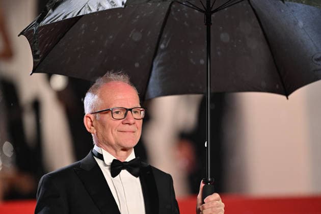 79th Cannes Film Festival: Her Private Hell screening CANNES, FRANCE - MAY 18: Cannes film festival director Thierry Fremaux holds an umbrella as the cast arrives for the screening of the film Her Private Hell at the 79th edition of the Cannes Film Festival in Cannes, France on May 18, 2026. Mustafa Yalcin Anadolu Cannes France. Editorial use only. Please get in touch for any other usage.  Copyright: x2026xAnadoluxMustafaxYalcinx
