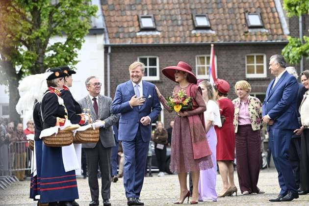 Wessem, The Netherlands, 2026-05-19 09:32:51 WESSEM, 19-05-2026 King Willem Alexander and Queen Maxima during a regional visit to the municipalities of Maasgouw, Echt-Susteren, Roerdalen, and Roermond. PHOTO: NLBeeld Patrick van Emst In the photo: The regional visit starts in Wessem, where the Royal Couple is musically welcomed by local music associations and the local militia. Subsequently, the Couple engages in conversation with members of associations, including young people, about the significance of associational life for the quality of life and the ways in which new generations are involved. Credit: NL Beeld Patrick van Emst Copyright: xx x