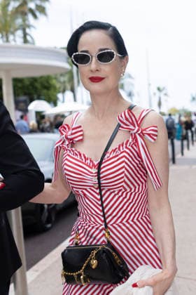 Cannes Dita Von Teese exits Martinez MP Cannes, France- May 19: Dita Von Teese leave the Martinez Hotel during 79th Festival of Cannes, on May 19 2026 in Cannes, France. Photo by Marco Piovanotto Abacapress.com Cannes France  Copyright: xPiovanottoxMarco ABACAx