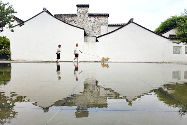 (260519) -- BEIJING, May 19, 2026 -- Tourists visit the Qingguoxiang historical and cultural block in Changzhou, east China s Jiangsu Province, May 19, 2026. This Tuesday marks the 16th China Tourism Day. (Photo by Xinhua) CHINA-TOURISM DAY (CN) ChenxWei 