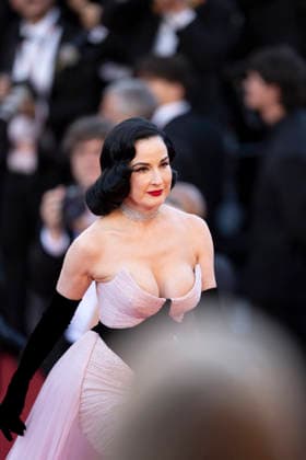 Cannes Amarga Navidad (Bitter Christmas) Red Carpert EB Dita von Teese on the red carpet before the Amarga Navidad (Bitter Christmas) screening during the 79th annual Cannes Film Festival at Palais des Festivals on May 19, 2026 in Cannes, France.Photo by Eliot Blondet ABACAPRESS.COM Cannes France France  Copyright: xBlondetxEliot ABACAx