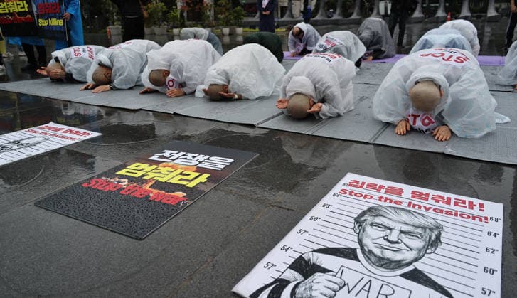 Buddhist monks, activists call for peace in the Middle East Monks of the Jogye Order and peace activists perform 108 prostrations in front of the US Embassy in Seoul, South Korea, on May 20, 2026. The demonstrators utilized the traditional Buddhist ritual to pray for an immediate end to the conflict in the Middle East and to advocate for global peace. Seoul South Korea  Copyright: xMatrixxImagesx xLeexSang-hoonx