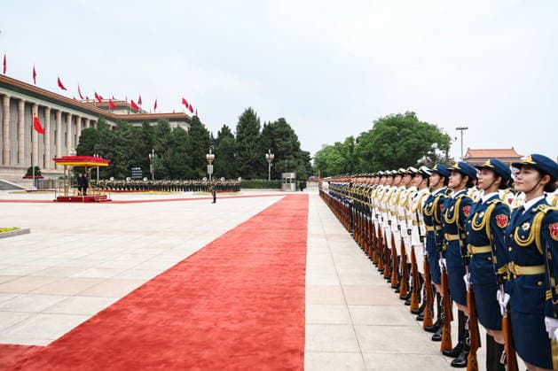 CHINA, BEIJING - MAY 20, 2026: Vladimir Putin (L), President of Russia, and his counterpart Xi Jinping of China attend a welcoming ceremony in Tiananmen Square. Putin s official visit marks 25 years since the 2001 Treaty of Good Neighbourliness and Friendly Cooperation between Russia and China. Alexander Kazakov Russian Presidential Press and Information Office TASS  92771014