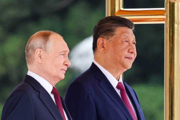 CHINA, BEIJING - MAY 20, 2026: Vladimir Putin (L), President of Russia, and his counterpart Xi Jinping of China attend a welcoming ceremony in Tiananmen Square. Putin s official visit marks 25 years since the 2001 Treaty of Good Neighbourliness and Friendly Cooperation between Russia and China. Alexander Kazakov Russian Presidential Press and Information Office TASS  92771028