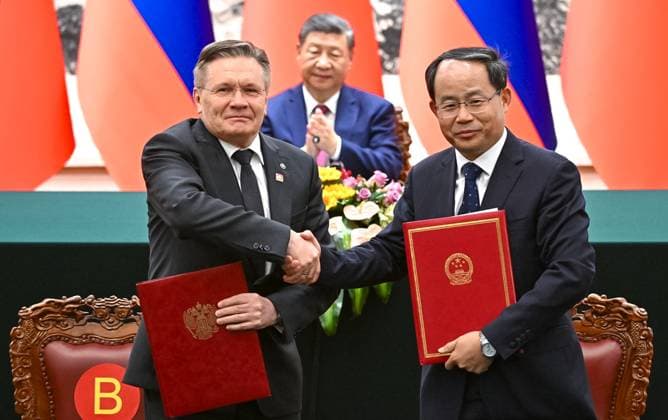 China Russia 9169450 20.05.2026 Rosatom State Atomic Energy Corporation Director General Alexey Likhachev and China Atomic Energy Authority (CAEA) Director Shan Zhongde attend a signing ceremony following a meeting of Russian President Vladimir Putin with Chinese President Xi Jinping in expanded format at the Great Hall of the People in Beijing, China. Kristina Solovyova Sputnik Beijing China  Copyright: xKristinaxSolovyovax