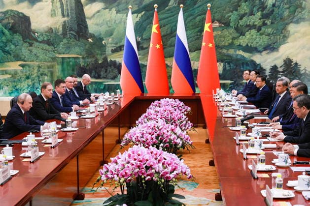 CHINA, BEIJING - MAY 20, 2026: Vladimir Putin (L), President of Russia, and his counterpart Xi Jinping (2nd R) of China hold bilateral talks at the Great Hall of the People. Putin s official visit marks 25 years since the 2001 Treaty of Good Neighbourliness and Friendly Cooperation between Russia and China. Vladimir Smirnov TASS  92768108