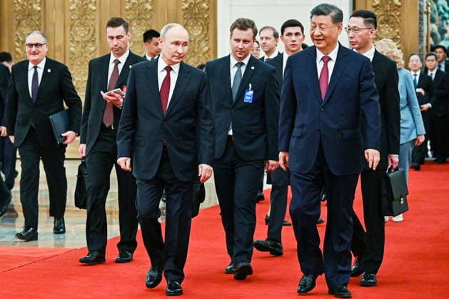 CHINA, BEIJING - MAY 20, 2026: Vladimir Putin, President of Russia, and his counterpart Xi Jinping (L-R front) of China emerge after a ceremony to sign joint documents from bilateral talks at the Great Hall of the People. Putin s official visit marks 25 years since the 2001 Treaty of Good Neighbourliness and Friendly Cooperation between Russia and China. Kristina Solovyova POOL TASS  92772883