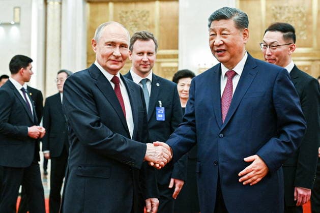 CHINA, BEIJING - MAY 20, 2026: Vladimir Putin, President of Russia, and his counterpart Xi Jinping (L-R front) of China emerge after a ceremony to sign joint documents from bilateral talks at the Great Hall of the People. Putin s official visit marks 25 years since the 2001 Treaty of Good Neighbourliness and Friendly Cooperation between Russia and China. Kristina Solovyova POOL TASS  92772869