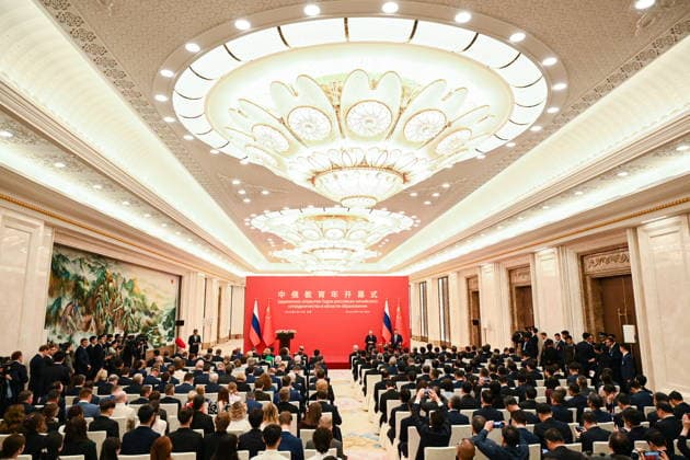 CHINA, BEIJING - MAY 20, 2026: Vladimir Putin, President of Russia, and his counterpart Xi Jinping (L-R back) of China attend a ceremony to declare 2026 and 2026 the Cross Years of Russian-Chinese Cooperation in Education at the Great Hall of the People. Putin s official visit marks 25 years since the 2001 Treaty of Good Neighbourliness and Friendly Cooperation between Russia and China. Kristina Solovyova POOL TASS  92774210