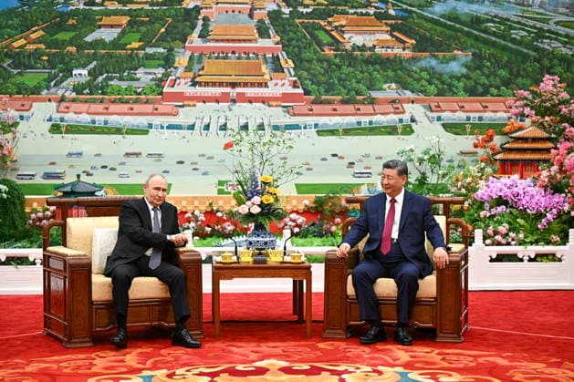 CHINA, BEIJING - MAY 20, 2026: Vladimir Putin (L), President of Russia, and his counterpart Xi Jinping of China hold an informal tea meeting at the Great Hall of the People. Putin s official visit marks 25 years since the 2001 Treaty of Good Neighbourliness and Friendly Cooperation between Russia and China. Kristina Solovyova POOL TASS  92782626
