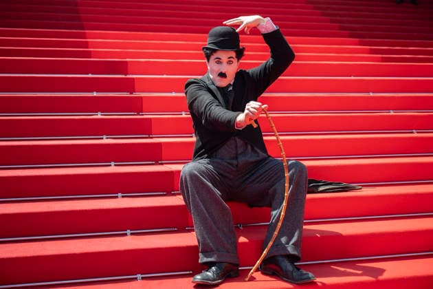 Cannes Notre Salut Red Carpert EB Charlie Chaplin lookalike Anthony Charlot Champeil on the red carpet before the Notre Salut screening during the 79th annual Cannes Film Festival at Palais des Festivals on May 20, 2026 in Cannes, France. Photo by Eliot Blondet ABACAPRESS.COM Cannes France France  Copyright: xBlondetxEliot ABACAx