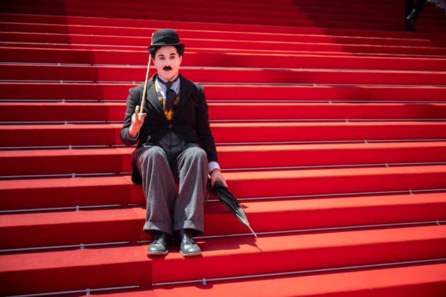 Cannes Notre Salut Red Carpert EB Charlie Chaplin lookalike Anthony Charlot Champeil on the red carpet before the Notre Salut screening during the 79th annual Cannes Film Festival at Palais des Festivals on May 20, 2026 in Cannes, France. Photo by Eliot Blondet ABACAPRESS.COM Cannes France France  Copyright: xBlondetxEliot ABACAx