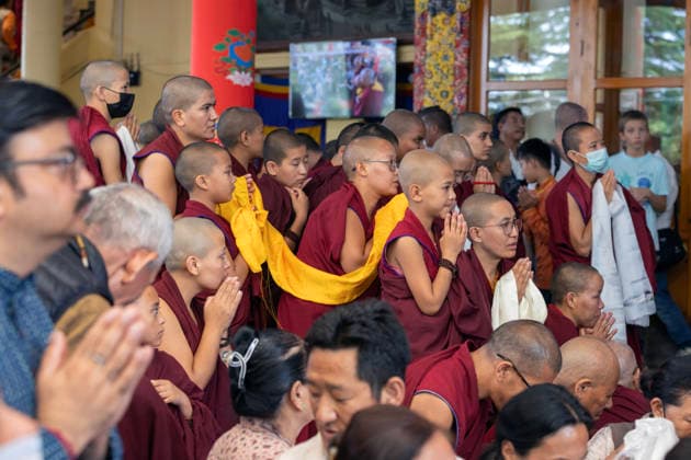 May 20, 2026, Palampur, Dharamshala, India: Novices monks and young budhist nuns watching Tibetan spiritual Leader the Dalai Lama (not in picture) leaving the temple after end of a long life prayer offered to him by Central Dokham Chushi Gangdrug and Himalayan Buddhist Cultural Association at the Main Tibetan Temple in Mcleodganj, Dharamshala ..NOTE: EDITORIAL USE ONLY. Palampur India - ZUMAb235 20260520_zip_b235_005 Copyright: xShaileshxBhatnagarx