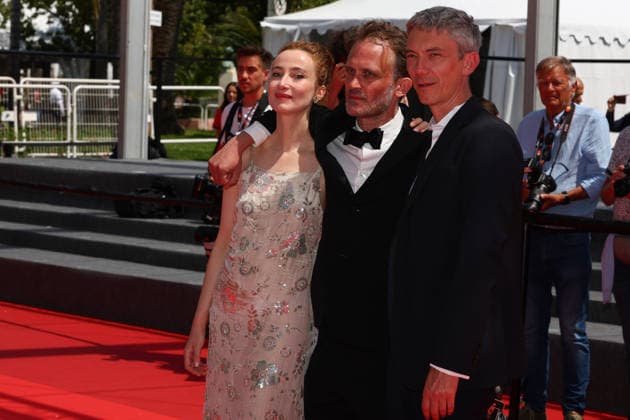 May 20, 2026, Cannes, Cote D azur, France: SANDRINE BLANCKE, EMMANUEL MARRE and SWANN ARLAUD on the red carpet for the screening of A MAN OF HIS TIME at the 79th Annual Cannes Film Festival at Palais des Festivals in Cannes, France Cannes France - ZUMAc179 20260520_zep_c179_013 Copyright: xMickaelxChavetx