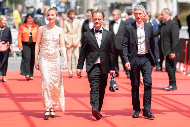 Cannes Notre Salut Red Carpert EB Belgian actress Sandrine Blancke, French director and screenwriter Emmanuel Marre and French actor Swann Arlaud on the red carpet before the Notre Salut screening during the 79th annual Cannes Film Festival at Palais des Festivals on May 20, 2026 in Cannes, France. Photo by Eliot Blondet ABACAPRESS.COM Cannes France France  Copyright: xBlondetxEliot ABACAx