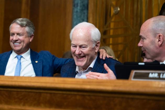 Senate Reconciliation Bill Markup UNITED STATES - MAY 20: Sens. John Cornyn, R-Texas, center, Roger Marshall, R-Kan., left, and Mike Lee, R-Utah, arrive for the Senate Budget Committee markup of The Reconciliation Bill Pursuant to S.Con.Res.33, in Dirksen building on Wednesday, May 20, 2026. President Donald Trump endorsed Cornyn™s opponent Ken Paxton in the Texas Senate primary. (Tom Williams CQ Roll Call) Washington DC United States EDITORIAL USE ONLY Copyright: x2026xCQ-RollxCall,xInc.x TomxWilliamsx rollcallpix171116