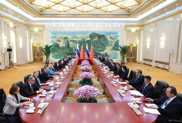 (260520) -- BEIJING, May 20, 2026 -- Chinese President Xi Jinping holds small-group talks with Russian President Vladimir Putin, who is on a state visit to China, at the Great Hall of the People in Beijing, capital of China, May 20, 2026. Xi held talks with Putin at the Great Hall of the People in Beijing on Wednesday. ) CHINA-BEIJING-XI JINPING-RUSSIA-PUTIN-TALKS (CN) WangxYe 
