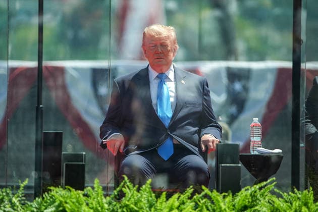 President Donald Trump attends the United States Coast Guard Academy s graduation ceremony in New London, Connecticut on Wednesday, May 20, 2026. Trump will deliver the commencement address.  CONN20260520436 ANGELINAxKATSANIS